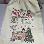 personalised girl in pink dressing gown polar express christmas santa sack