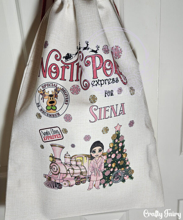 personalised girl in pink dressing gown polar express christmas santa sack