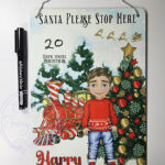personalised red polar express train & boy in jumper christmas santa stop here metal sign