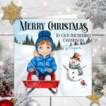 personalised young boy on sledge in snow christmas card for son grandson