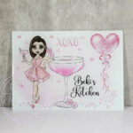 personalised pink lady with love heart cocktail glass chopping board or worktop protector