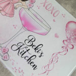 personalised pink lady with love heart cocktail glass chopping board or worktop protector
