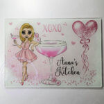 personalised pink lady with love heart cocktail glass chopping board or worktop protector