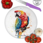 personalised colourful parrot glass chopping board or worktop protector