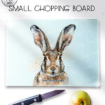 personalised hare face glass chopping board or worktop protector