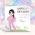 personalised toddler girl in hearts & daisy pink tracksuit birthday card