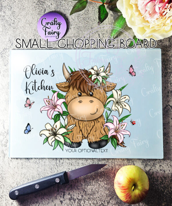 personalised highland cow with pink lily flowers glass chopping board or worktop protector