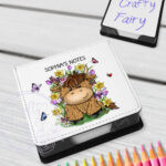 personalised highland cow with bright spring flowers memo note holder
