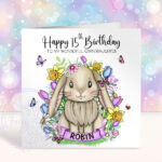 personalised cute bunny rabbit with bright spring flowers birthday card