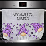 personalised gonks with purple leopard print hats waffle tea towel
