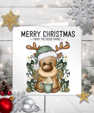 personalised reindeer in green santa hat with hot chocolate christmas card