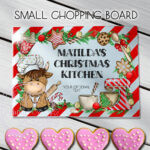 personalised highland cow chef and red striped christmas glass chopping board